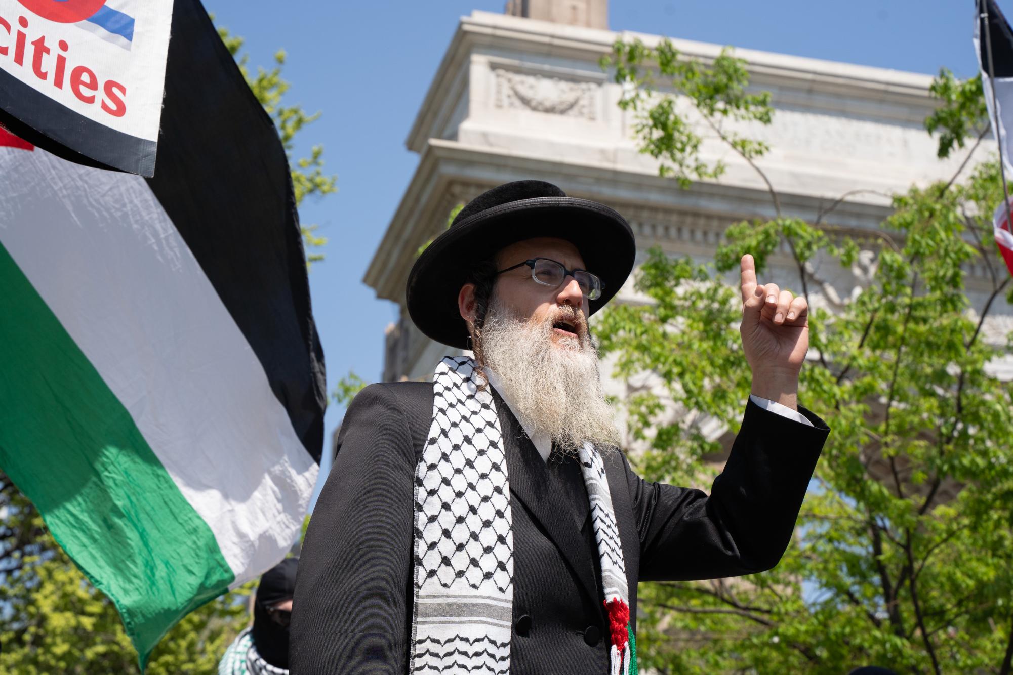 Students hold cross-campus march for divestment, noncitizen support